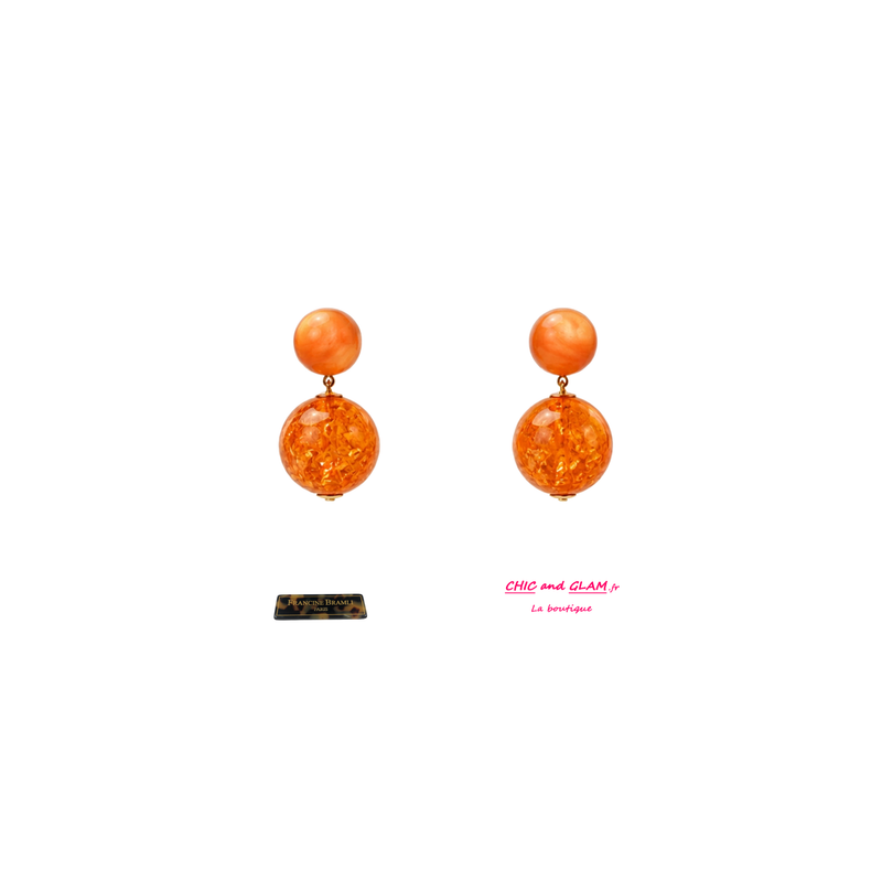 B.O Boule percé  ton orange Francine Bramli .